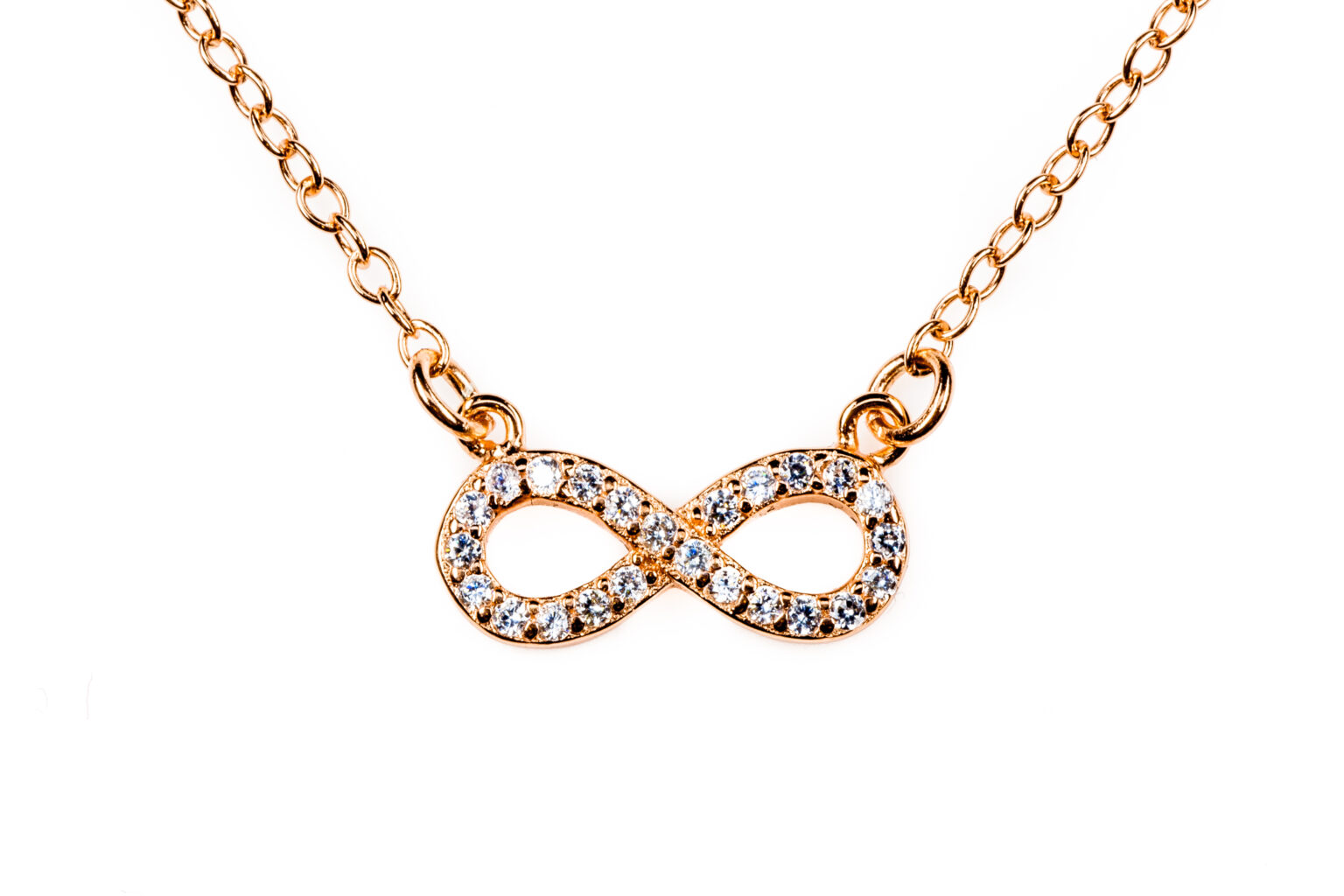 Bronze infinity pendant with diamonds  on a chain